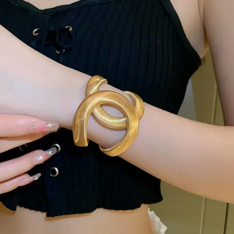 Gold Farbe Hohl Schlange-förmigen Armband Für Frauen Mode Einfache Versetzt Offene Elastische Armband Übertrieben Writband Schmuck