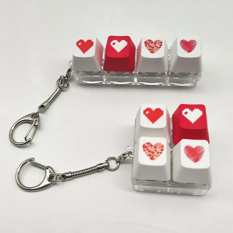 1pc Schlüssel bund für Mädchen Dekompression Spielzeug Finger Tastatur Spielzeug Schlüssel anhänger für Frauen Party Geschenk mechanische Tastatur Welle Tester