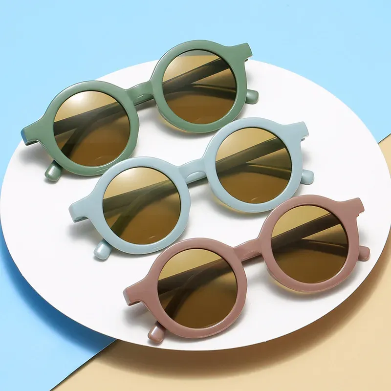 Neue modische runde Sonnenbrille in Bonbonfarben für Babys, Retro-Einfarbige Brillen, runde praktische Brillen für Kinder