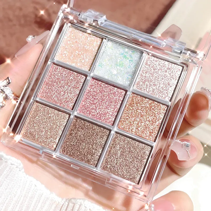 Neunfarbige Lidschattenpalette mit Perle, feinem Glanz, schichtbarem Schimmer, heller Glitzer und lebendigen Farben. Neu