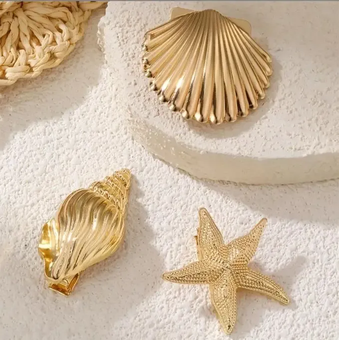 Neue modische Europa und Amerika Goldene Seestern Shell Entenschnabel Haarspange für Frauen elastische Mädchen Haarschmuck Kopfbedeckung