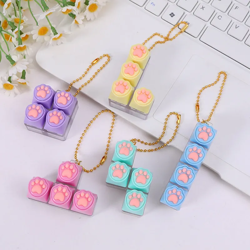 Silikon Katzenpfoten-Schlüsselanhänger Stressabbau-Spielzeug für Tastatur-Liebhaber Tragbarer Fidget-Schlüsselring Geschenke Druckknopf Angstlinderung