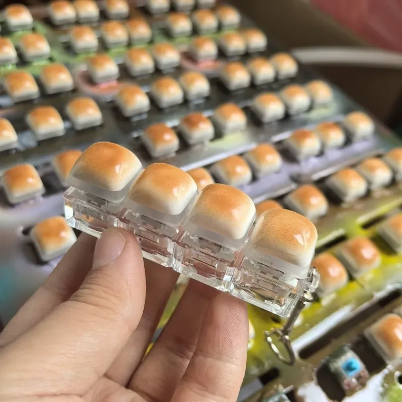 Brot-Tastenkappen-Stressabbau-Klicker, Fingerspitzen-Spielzeug, Schlüsselanhänger im mechanischen Tastatur-Stil, kreatives Geschenk, Schreibtisch-Spielzeug, 1 Stück