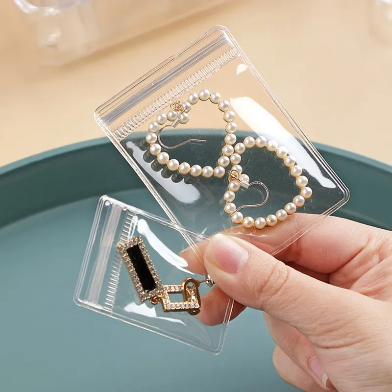 50 Stück Schmuck-Aufbewahrungsbeutel, Ohrringe, Ringe, Handornamente, Antioxidation, transparente staubdichte Aufbewahrungsbeutel 2030